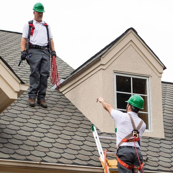 roofers preparing a roof for roof restoration