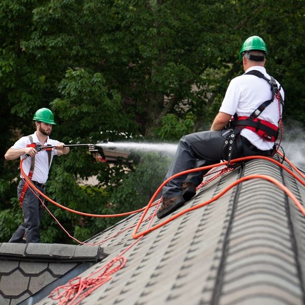 Guaranteed Roof team applying Roof Maxx