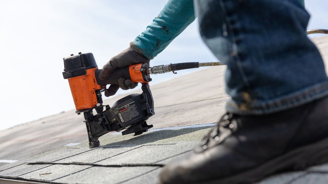 Hand stapling shingles