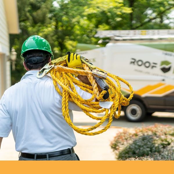local roofer preparing for roof rejuvenation service