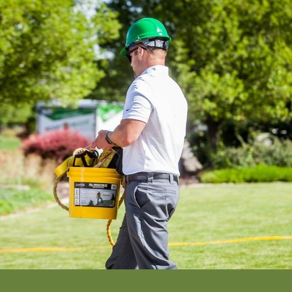 roofer carrying supplies