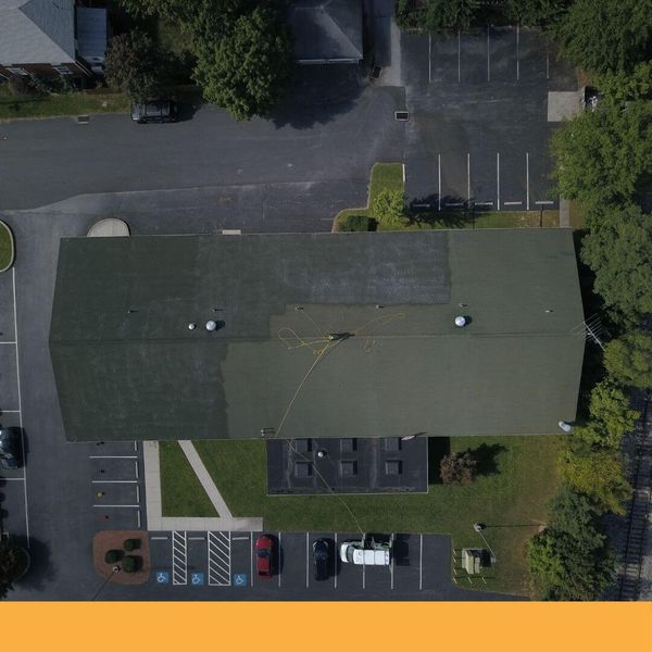 arial view of a roof being cleaned