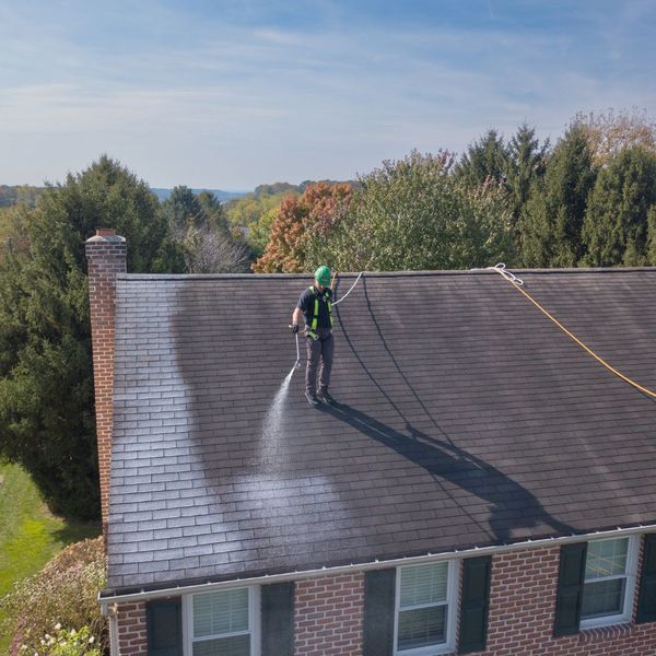 Roof tech rejuvenating roof and cleaning it Roof tech rejuvenating roof and cleaning it