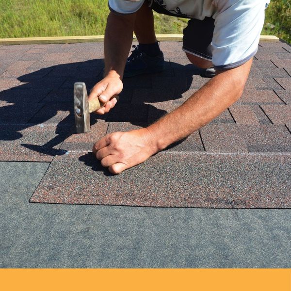 roofer fixing shingles roofer fixing shingles