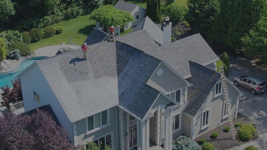 people cleaning a large roof Improve the Lifespan of Your Roof Hero.jpg