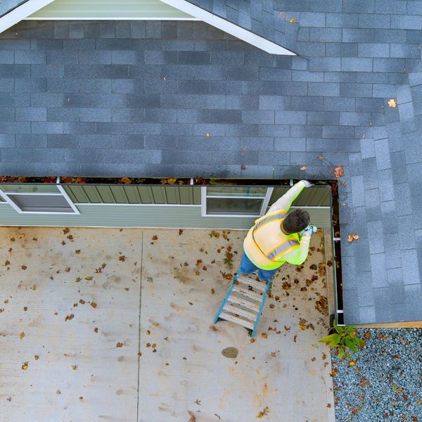 cleaning debris from eaves