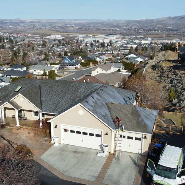 A roof in the process of being cleaned 