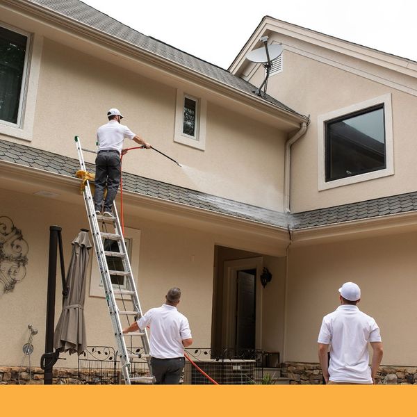 workers cleaning roof