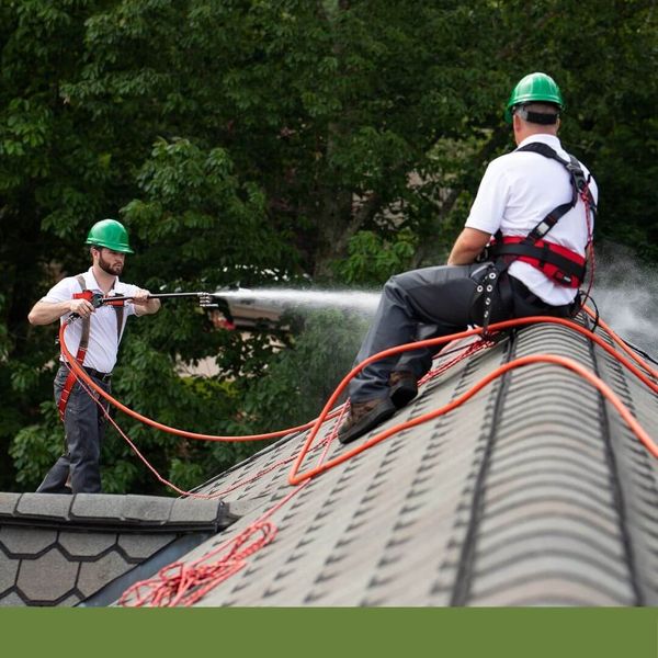 Guaranteed Roof team applying Roof Maxx