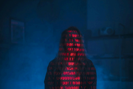 Image of a woman with binary code