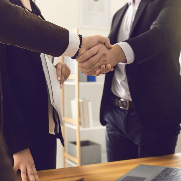 Business people shaking hands