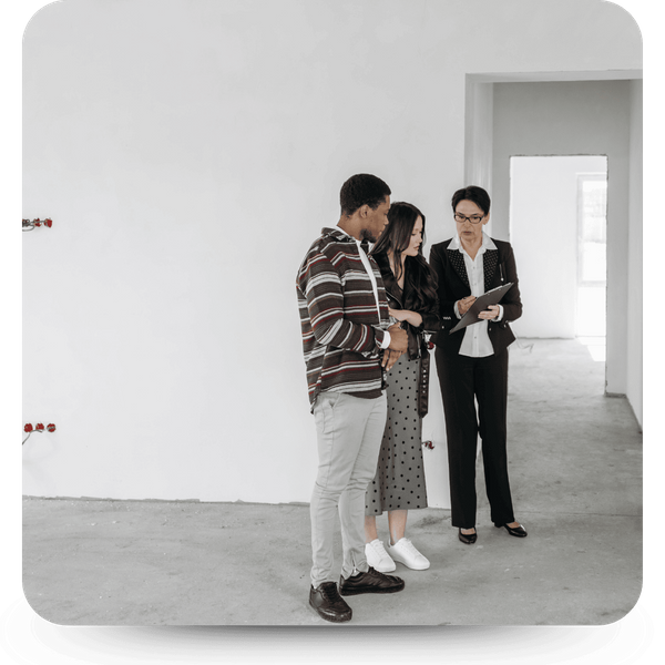 Image of a couple talking to a landlord