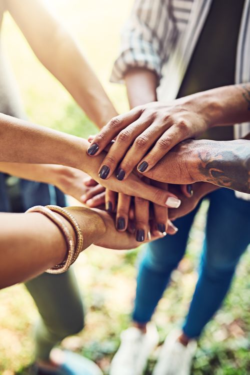 hands-together-in-unity-and-support-outdoors-2026-03-25-02-42-42-utc.jpg