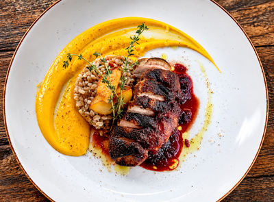 Seared Duck with Cherry Sauce and Thyme.png