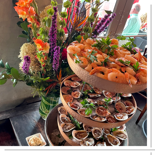 tiered catering trays, oysters and shrimps, bouquet