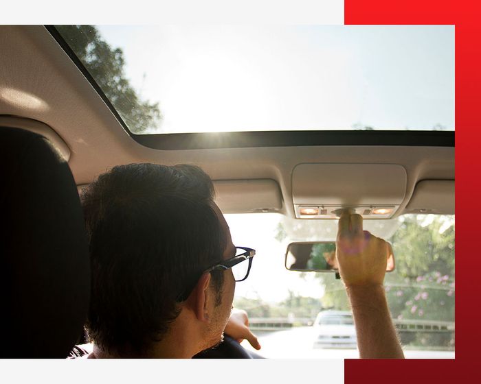 man adjusting sunroof