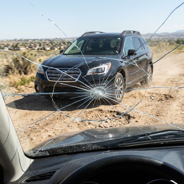 Car driving on a bumpy road causing vibrations.