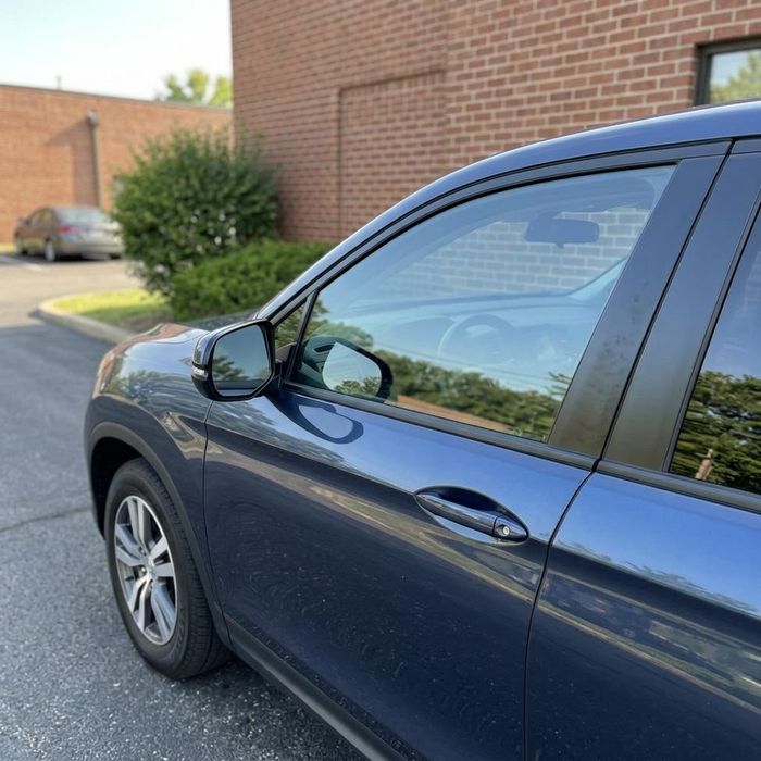SUV with a new passenger side window