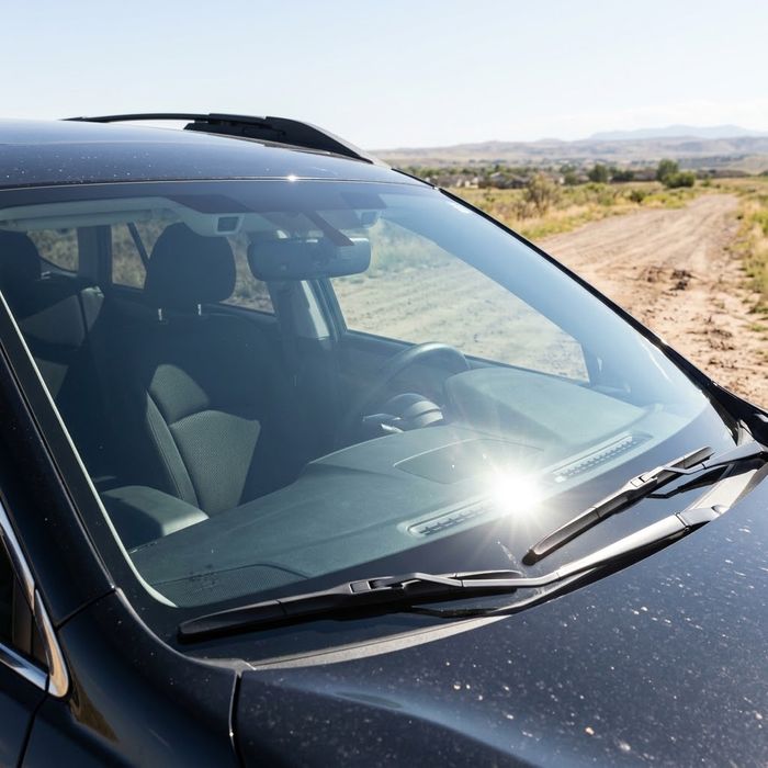 Newly installed, clean car windshield.