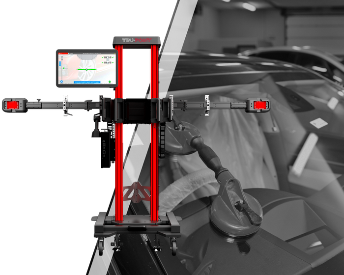 auto glass with tru point machine overlayed