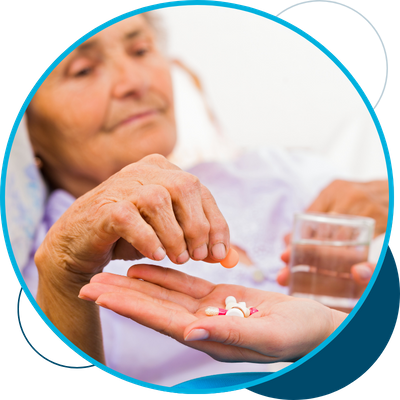 image of an elderly woman taking medication
