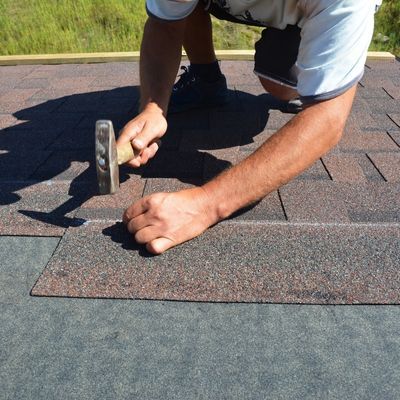 installing new shingles on roof