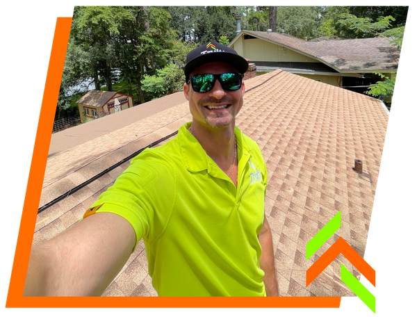 roofer smiling at camera on roof roofer smiling at camera on roof