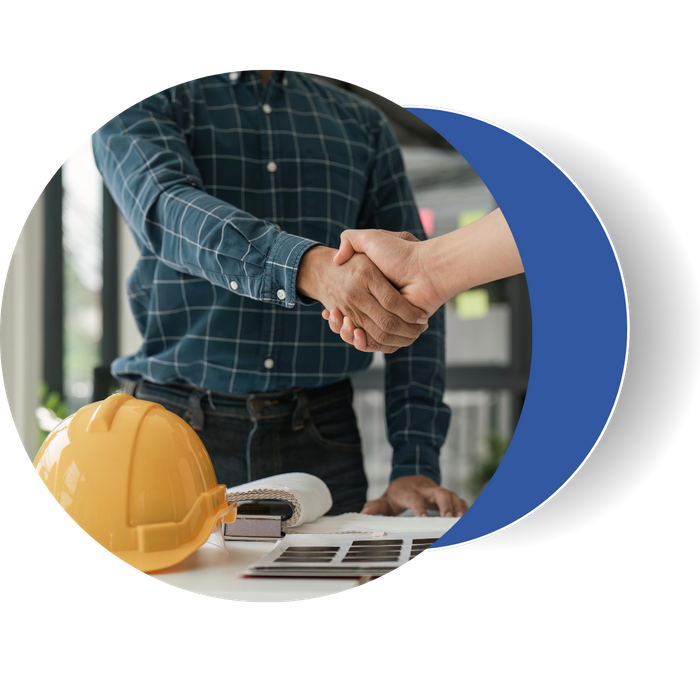 A roofing contractor and a business owner shaking hands