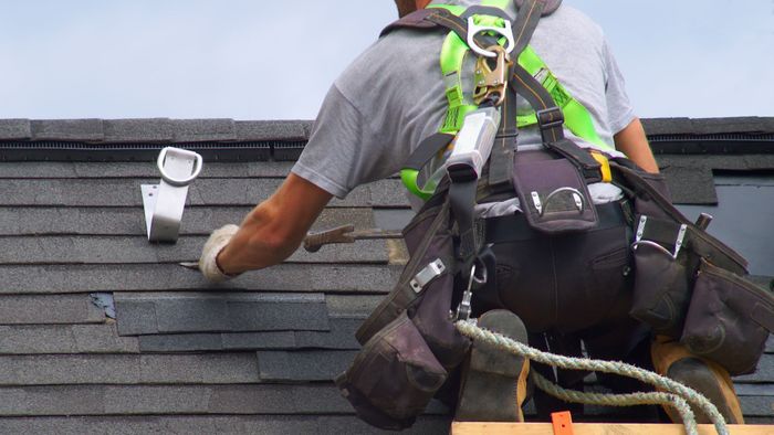 roofer working on roof