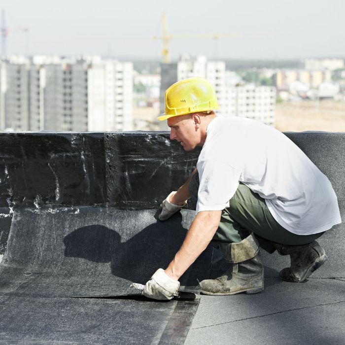 laying down layers on flat roof