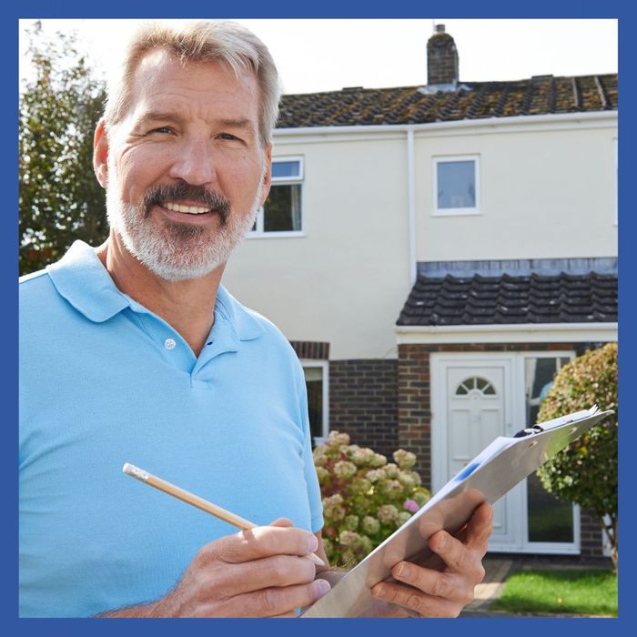 Man doing a roof estimate