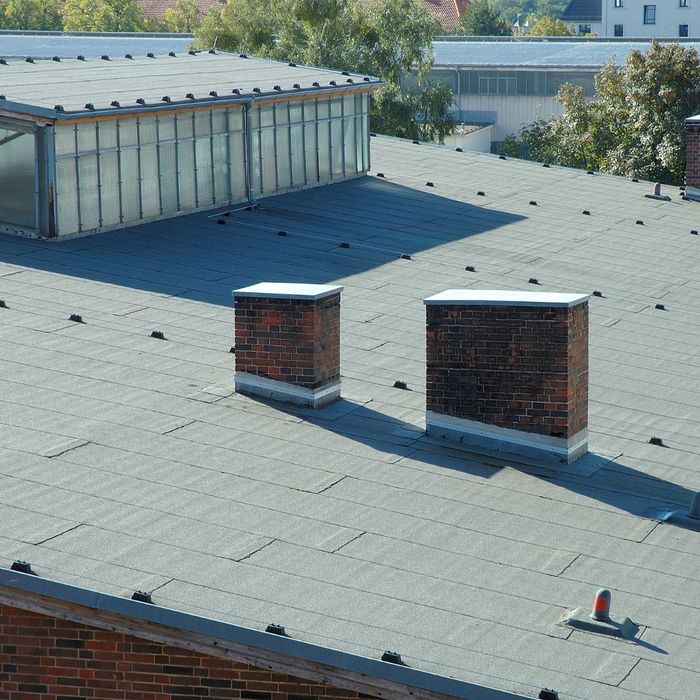 large near-flat roof in sun