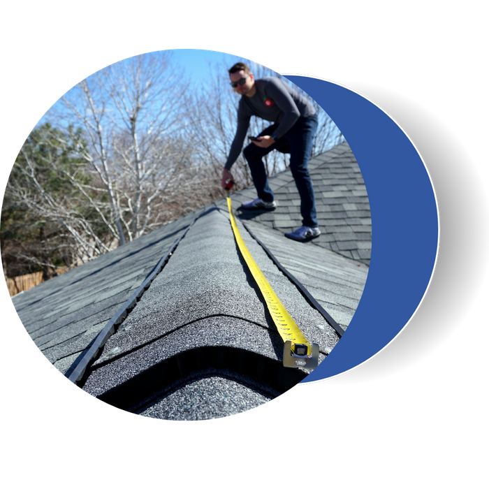 A roofing contractor measuring the peak of a roof