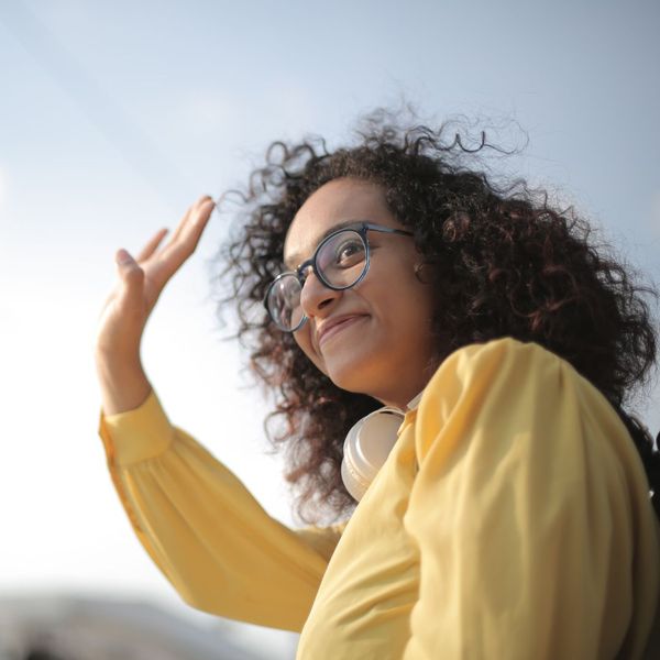 woman waving woman waving