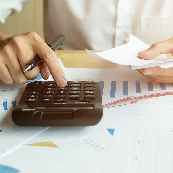 person using a calculator