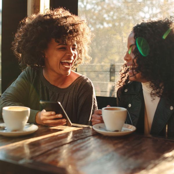women getting coffee women getting coffee