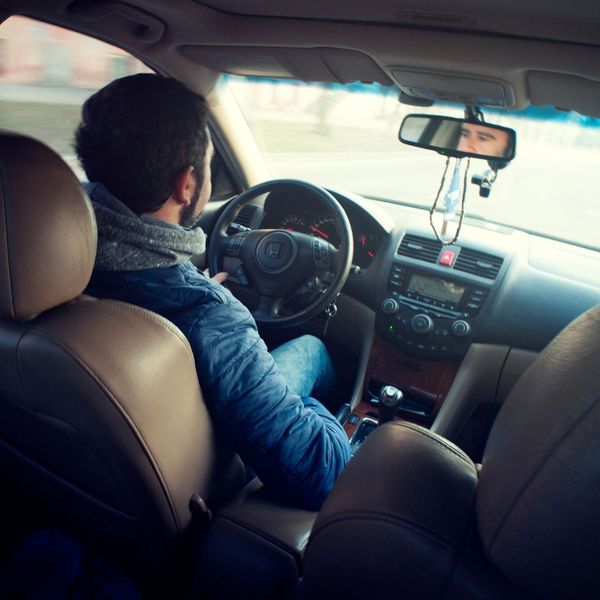 man driving car man driving car