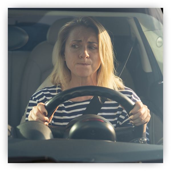 Woman stressed as a driver