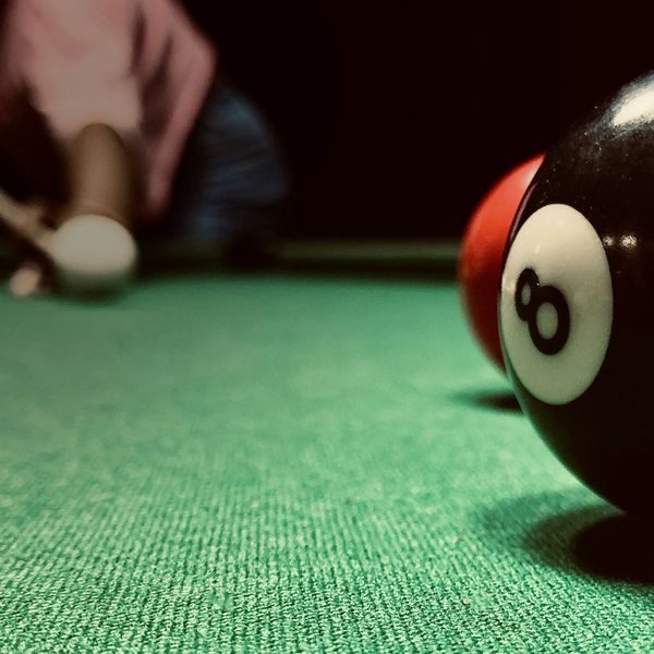 person playing pool