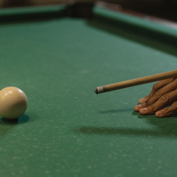 person playing pool