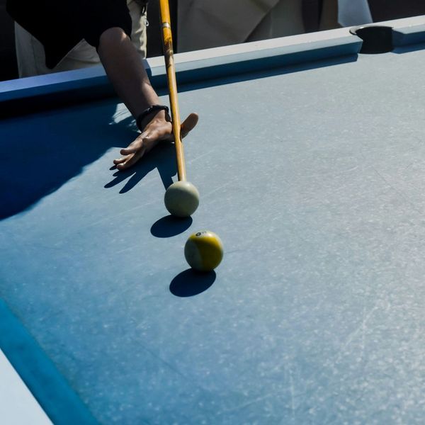 person playing pool