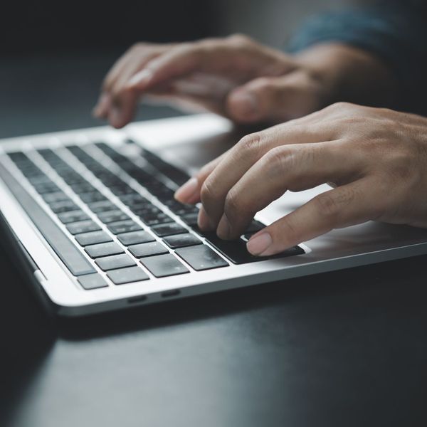 person using a laptop to research