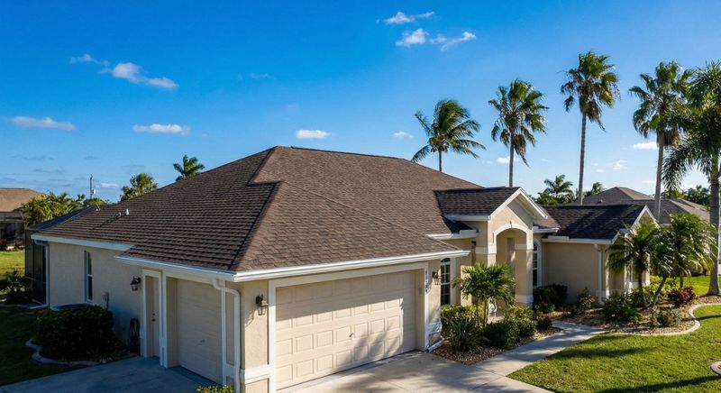 modern Florida home with a durable shingle roof