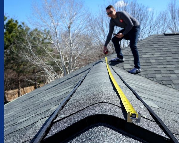 measuring roof for inspection 
