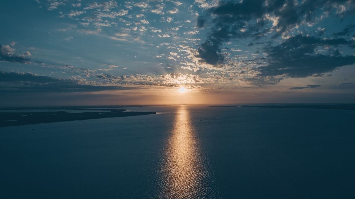sun rise over water 