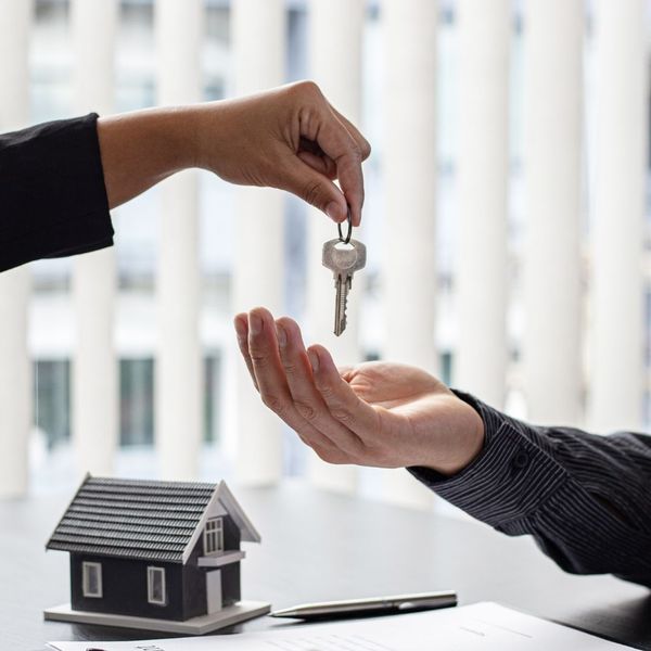 handing over key to rental property
