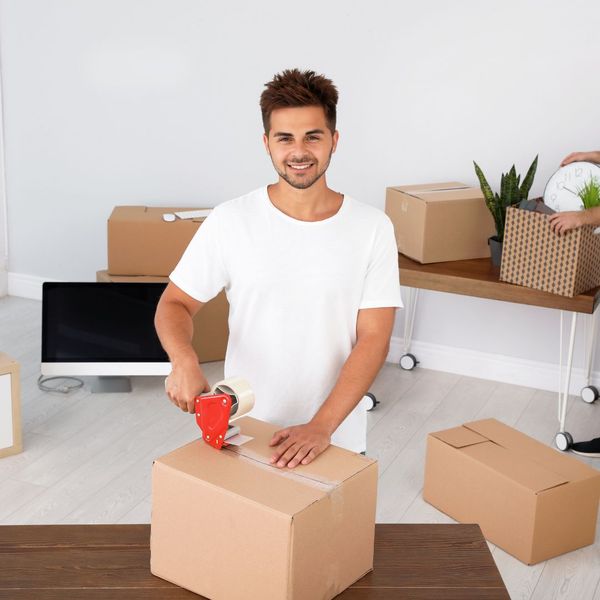 man packing a box man packing a box