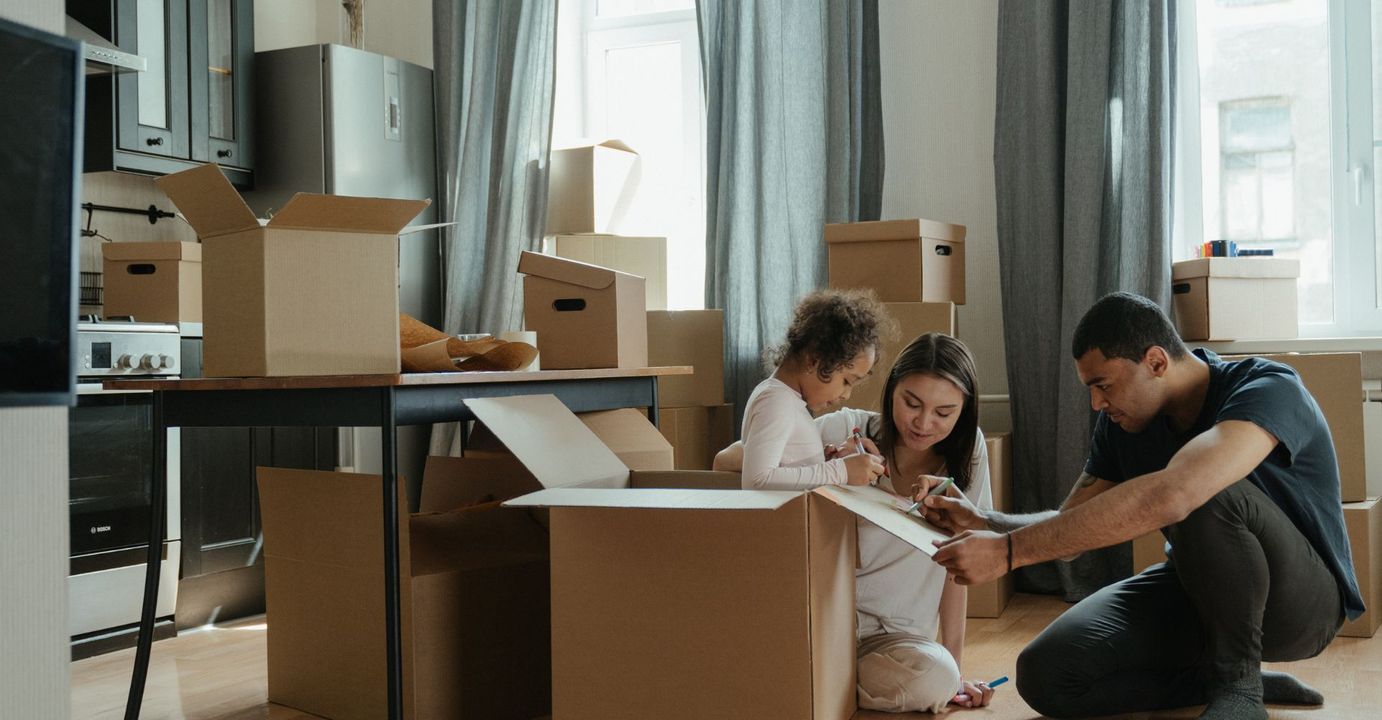 people unpacking boxes