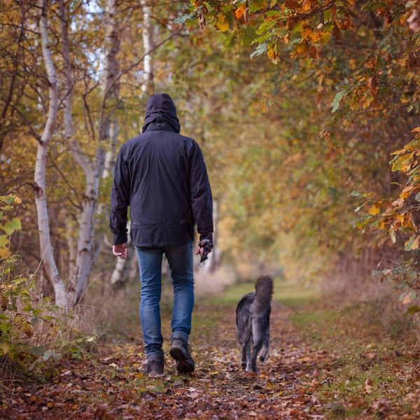 man walking his dog