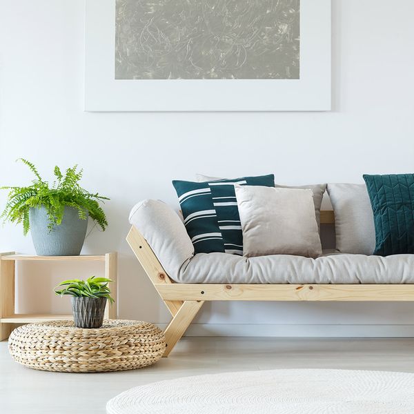 A nice couch in a modern-looking living room.